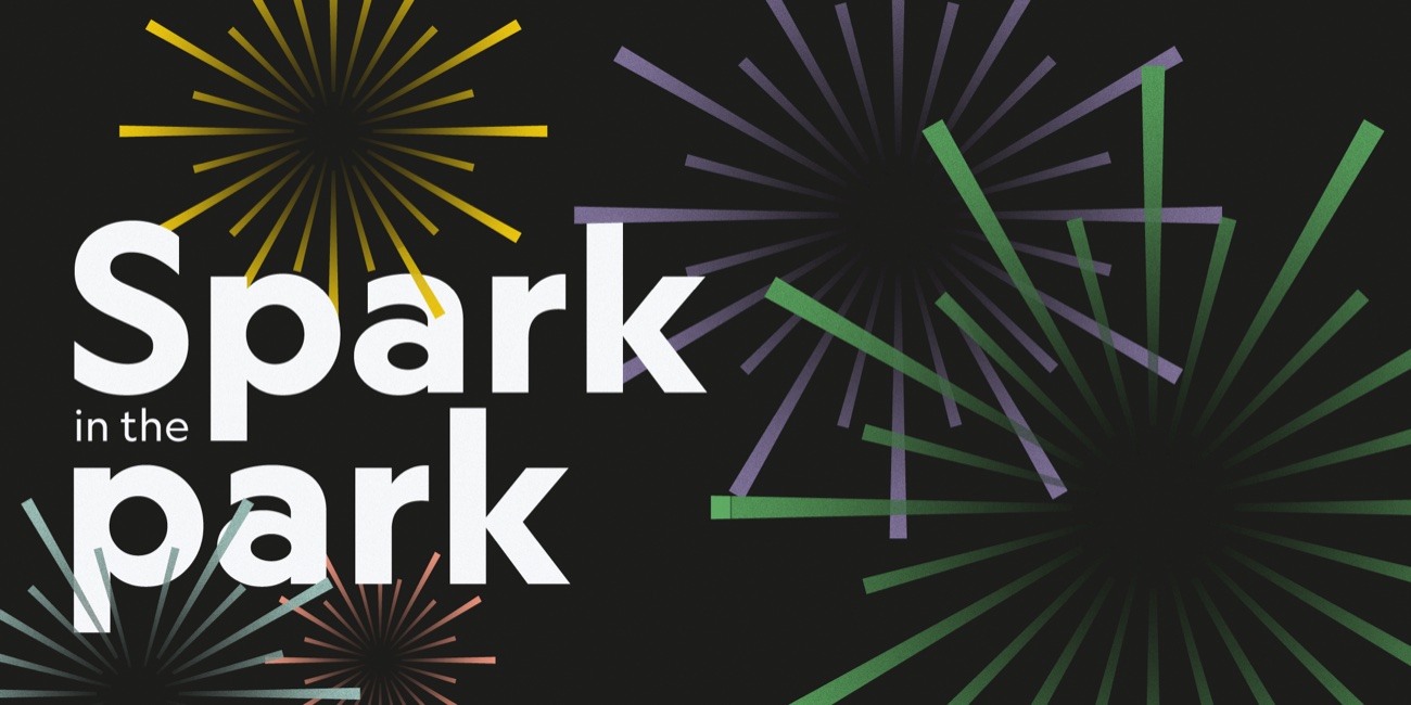 Artwork: Spark in the Park, in white lettering among yellow, purple, green and pink firework bursts on black.